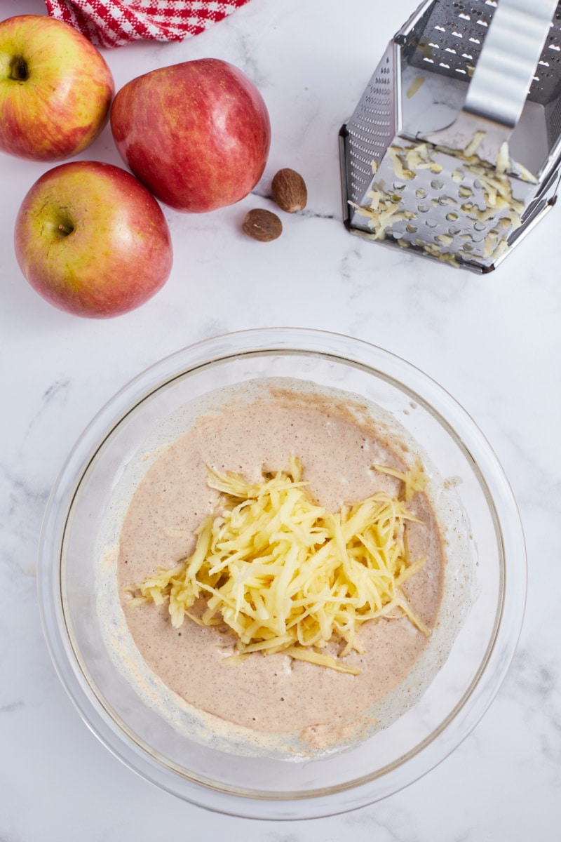 pancake batter with shredded apple inside