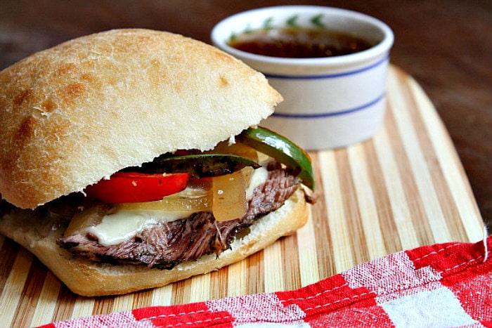 Slow Cooker French Dip Sandwiches recipe from RecipeGirl.com #slow #cooker #slowcooker #crockpot #cooked #slowcooked #french #dip #frenchdip #sandwich #sandwiches #easy #dinner #family #friendly #familyfriendly #recipe #RecipeGirl Slow Cooker French Dip Sandwiches with dipping broth