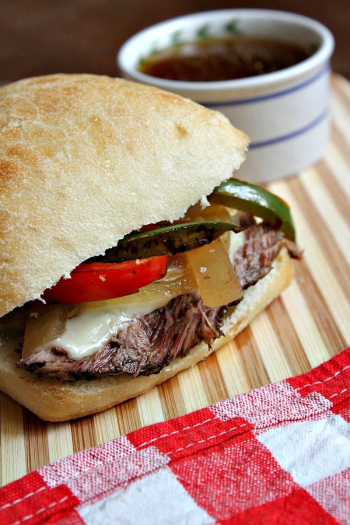 Slow Cooker French Dip Sandwiches recipe from RecipeGirl.com #slow #cooker #slowcooker #crockpot #cooked #slowcooked #french #dip #frenchdip #sandwich #sandwiches #easy #dinner #family #friendly #familyfriendly #recipe #RecipeGirl Slow Cooker French Dip Sandwiches with Dipping Broth