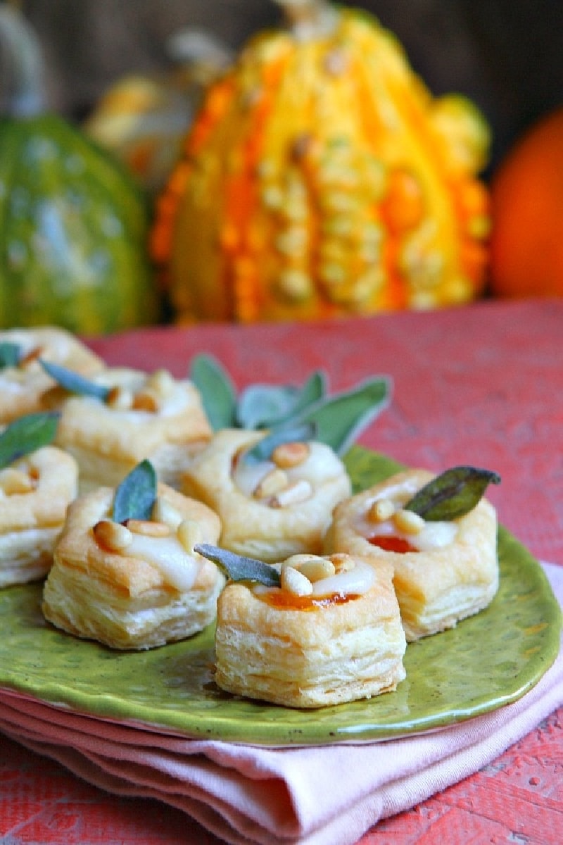 apricot brie bites appetizers on a green platter