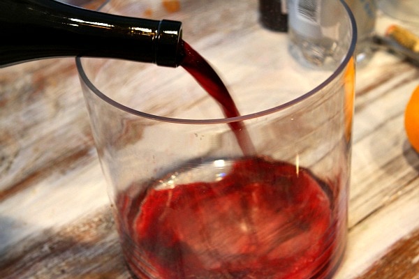 Pouring red wine into glass