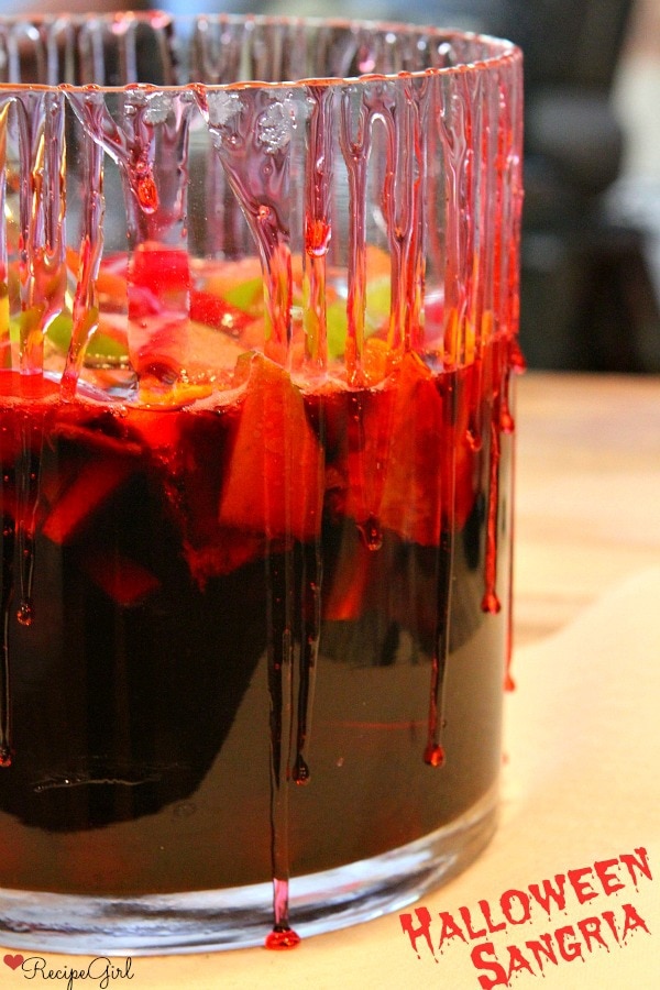 Halloween Sangria in a container with fake blood dripping down the sides