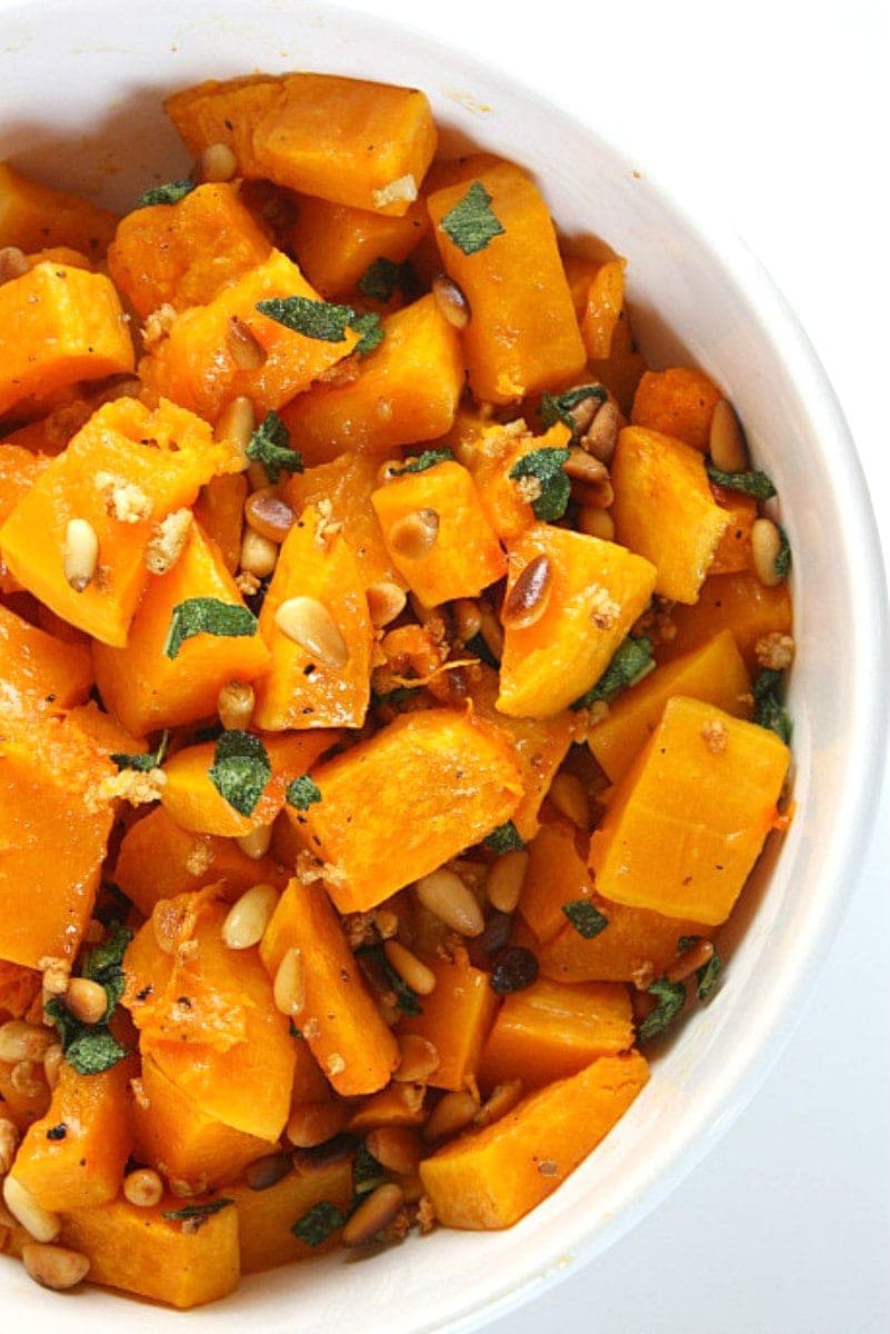 roasted butternut squash in a white baking dish