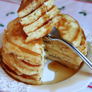 pinterest image for eggnog pancakes