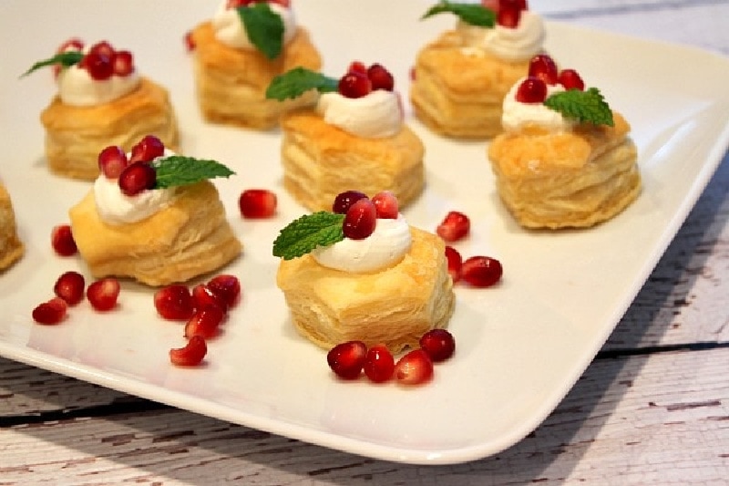 holiday cheesecake bites on a white plate