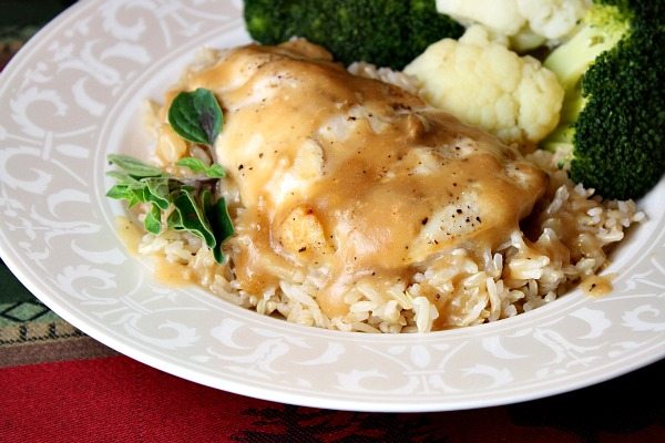Honey Mustard Pale Ale Chicken recipe from RecipeGirl.com Honey Mustard Pale Ale Chicken on a plate with rice and veggie