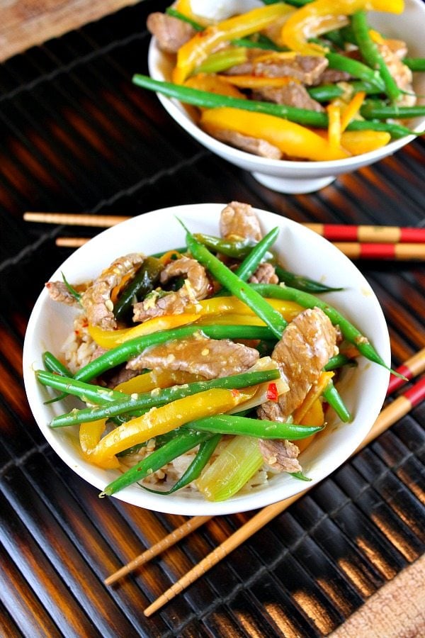 Szechuan Orange Ginger Beef recipe from RecipeGirl.com Szechuan Orange-Ginger Beef servings in bowls