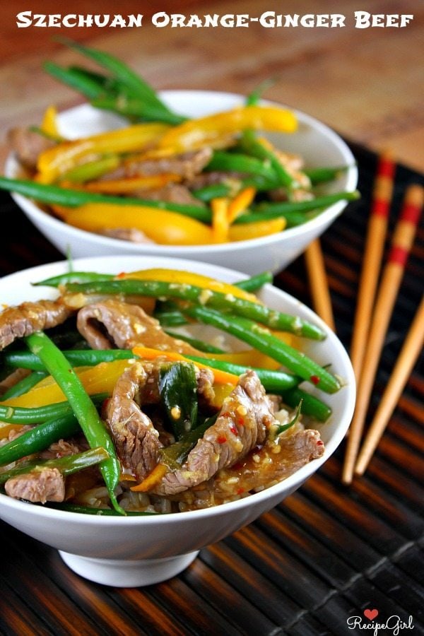 Szechuan Orange Ginger Beef recipe from RecipeGirl.com Szechuan Orange Ginger Beef servings in white bowls