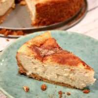 slice of snickerdoodle cheesecake on a green plate