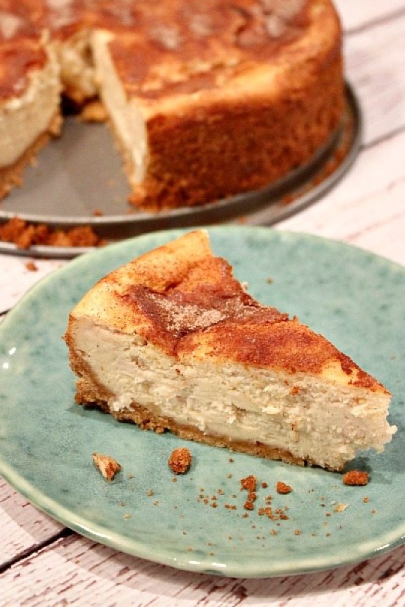 slice of snickerdoodle cheesecake on a green plate