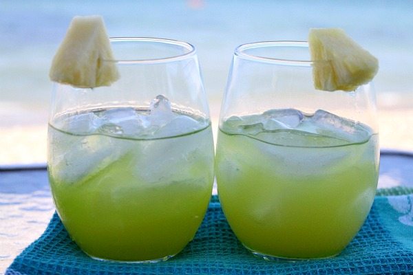 two Pearl Harbor cocktails sitting side by side on a blue towel