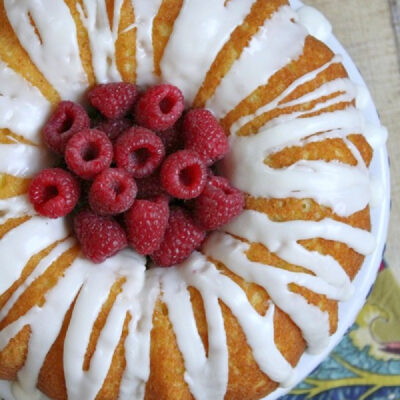 raspberry lemonade bundt cake with fresh raspberries