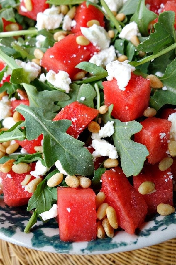 close up of watermelon, feta and arugula salad