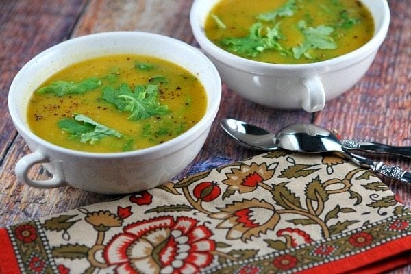 Butternut Squash and Kale Soup recipe from RecipeGirl.com Butternut Squash Soup with Kale in two white bowls