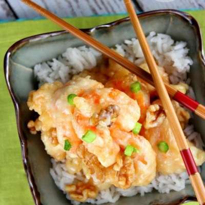 Honey Walnut Shrimp with chopsticks