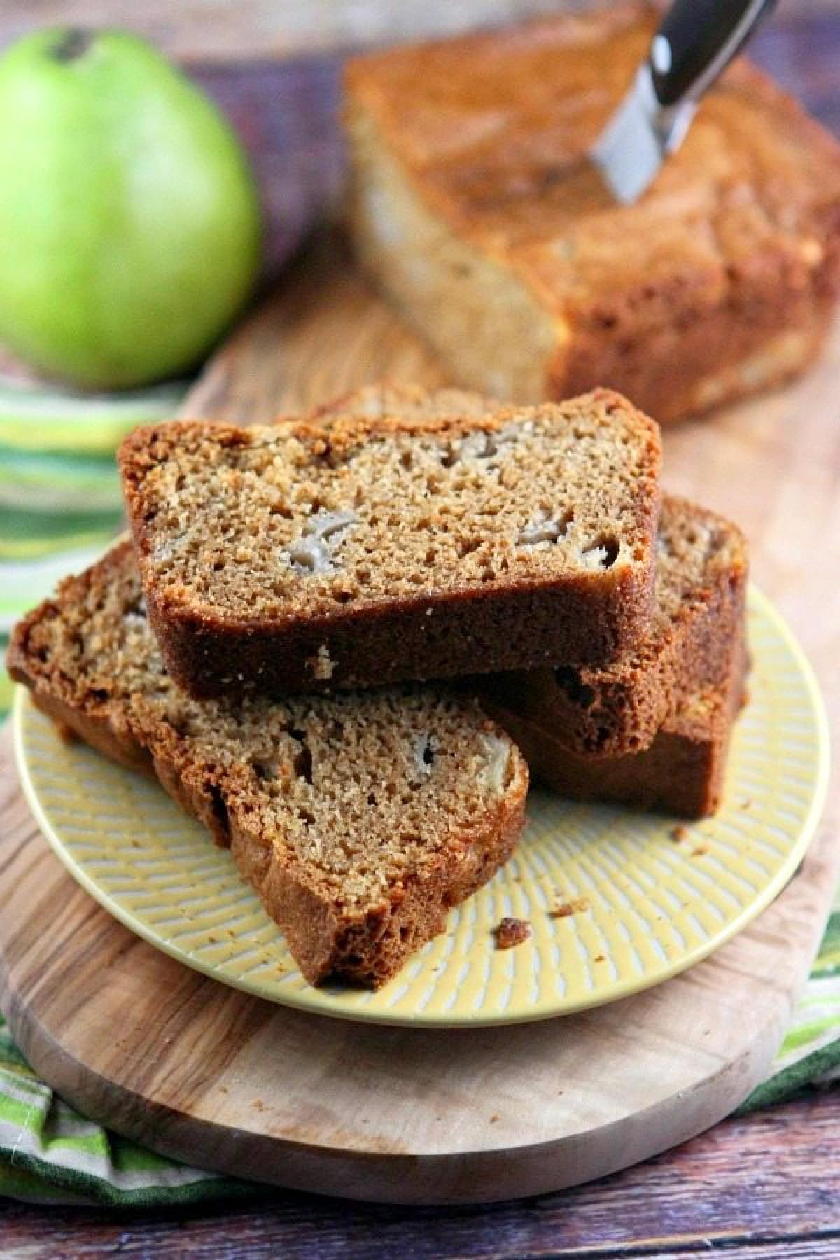 pear bread slices on a plate stacked