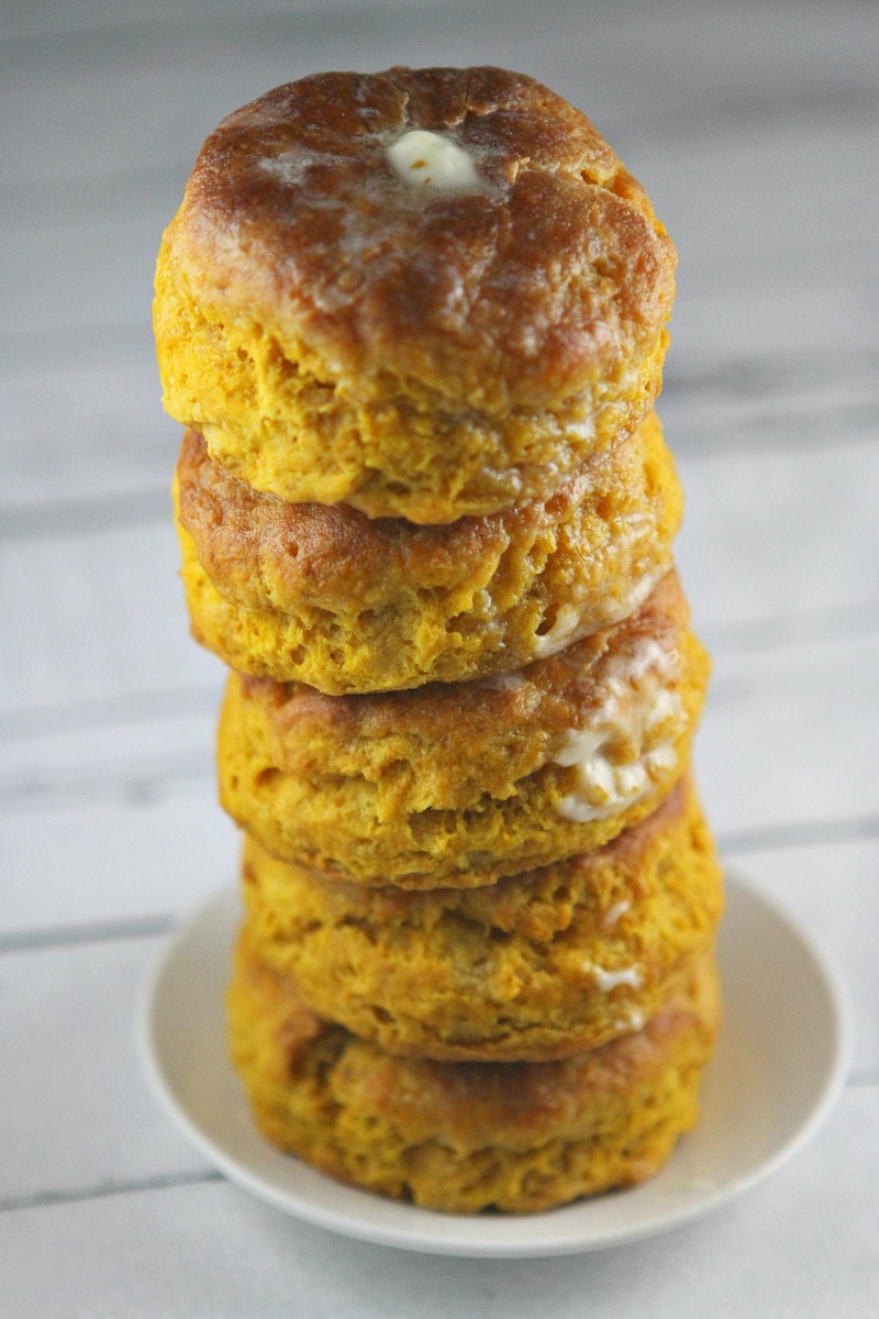 stack of Pumpkin Biscuits topped with butter