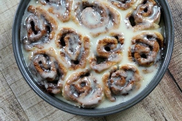 No Yeast Eggnog Cinnamon Rolls in pan with glaze