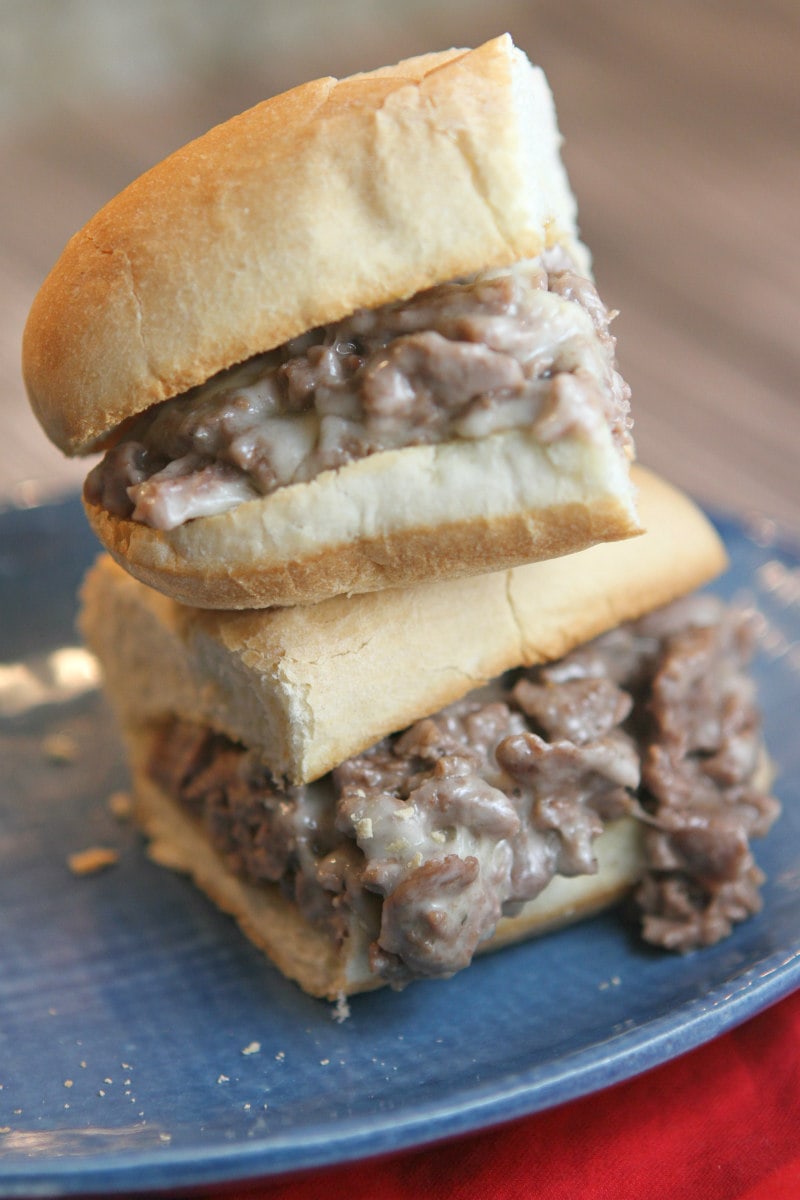 Philly Cheese Steak Sandwiches cut in half and stacked