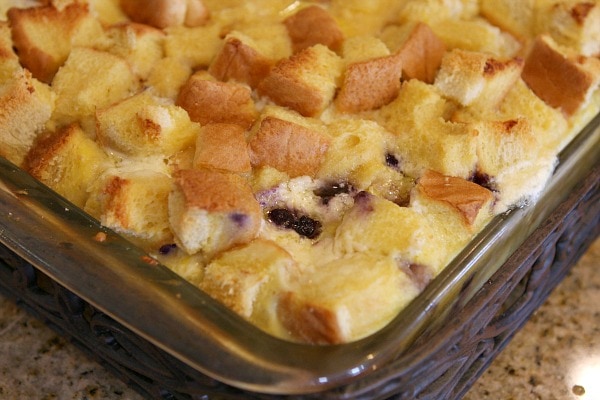 overnight blueberry french toast in a glass casserole dish just out of the oven