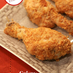 pinterest image for crispy oven baked chicken drumsticks