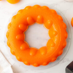 overhead shot of molded orange sherbet jello salad ring