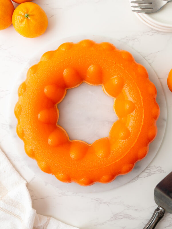 overhead shot of molded orange sherbet jello salad ring