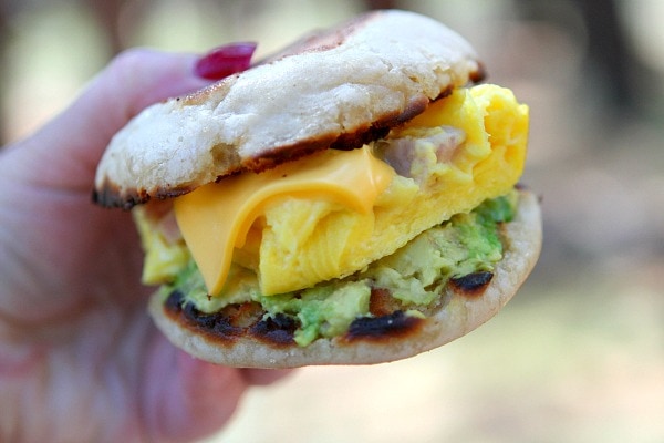 Hand holding a Camping Breakfast Sandwich 