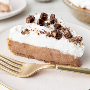 slice of candy bar pie on a plate