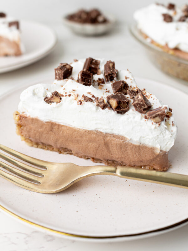 slice of candy bar pie on a plate