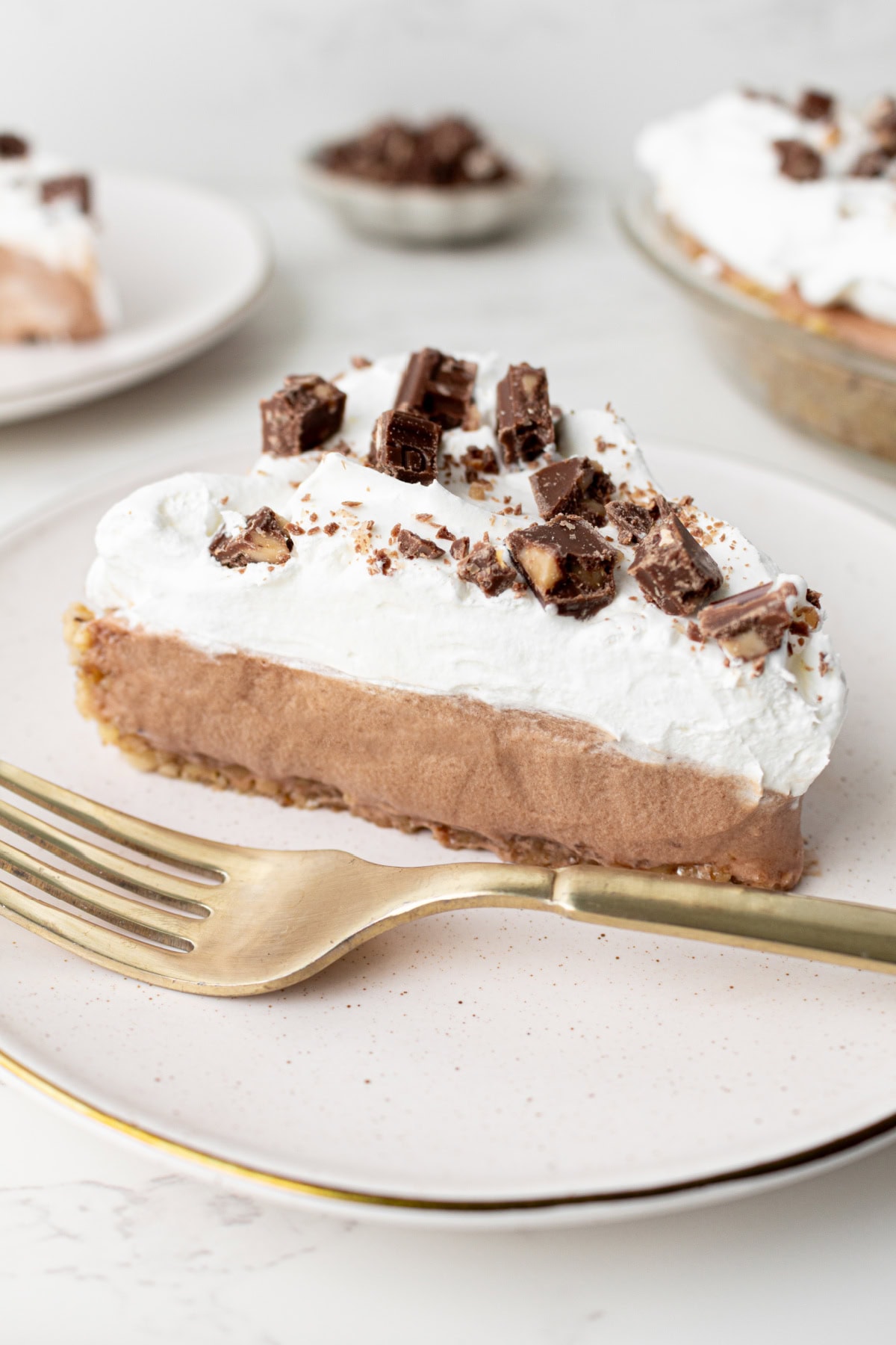 slice of candy bar pie on a plate