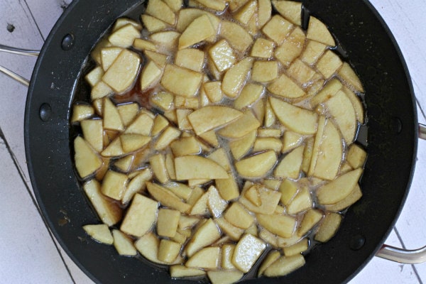 Apples sauteing in pan