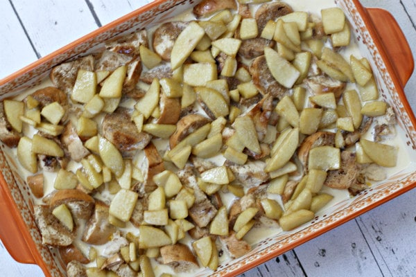 Caramel Apple Bagel Bread Pudding in casserole dish ready for oven