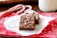 Easy, moist, chocolaty Peppermint Texas Sheet Cake smothered in peppermint infused chocolate frosting is the perfect, easy holiday dessert for you neighbors, friends and family!