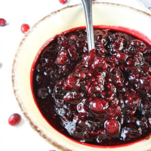 sherry triple berry cranberry sauce in bowl with spoon