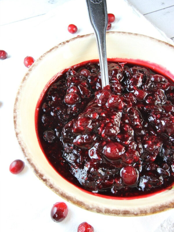 sherry triple berry cranberry sauce in bowl with spoon