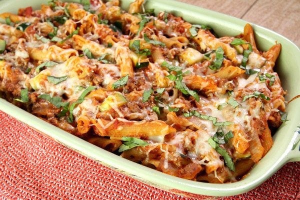 Cheesy Beef and Pasta Casserole recipe from RecipeGirl.com Cheesy Beef and Pasta Casserole in green casserole dish