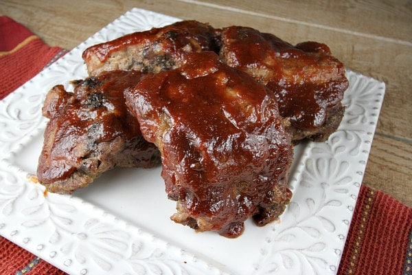 Slow Cooker Apple Butter BBQ Ribs on a white plate