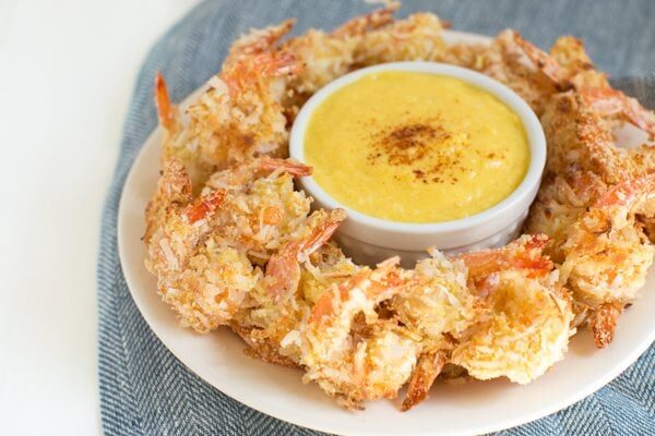 Coconut Shrimp with Mango Coconut Dipping Sauce is a fresh and flavorful appetizer or snack made with coconut flakes, fresh mango and more!