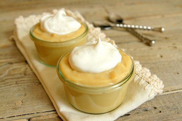 Butterscotch Pudding in two dishes with whipped cream