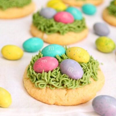 easter grass sugar cookies with chocolate eggs on top
