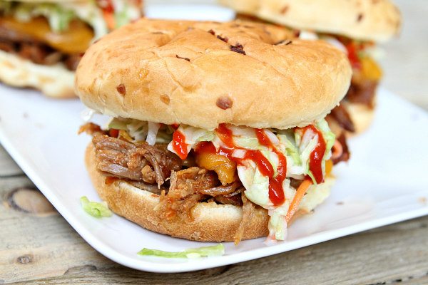 Sweet and Spicy Pulled Pork Sandwiches on a white platter