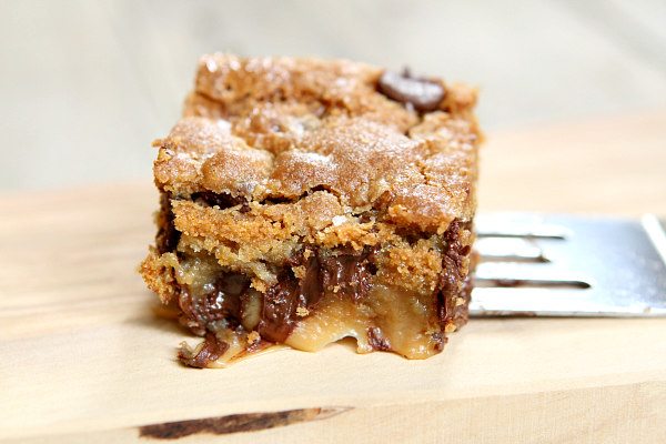 Gooey Salted Caramel Chocolate Chip Cookie Bar on spatula