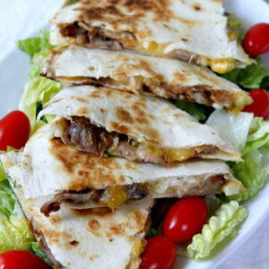 pinterest image for pork rib and corn quesadillas