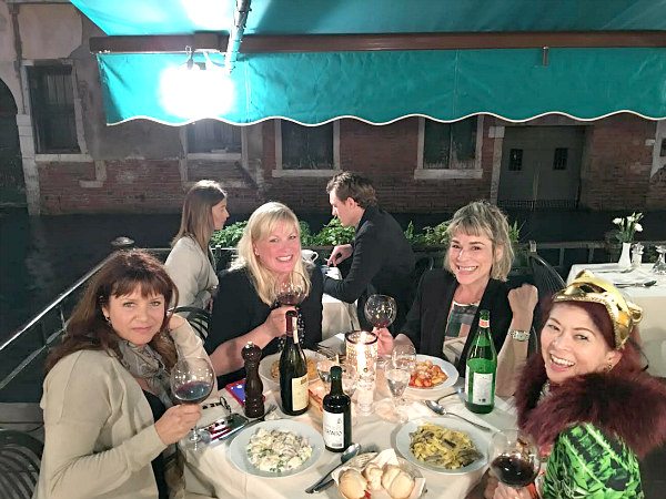 Girls Eating at a restaurant in Italy