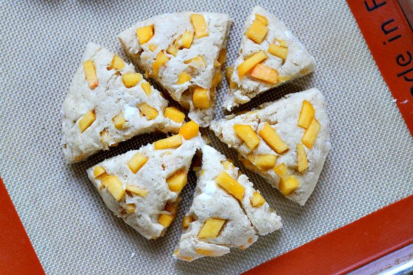 Fresh Peach Scones on a baking sheet ready to go into the oven