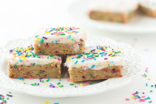 These Funfetti Frosted Blondies are dense, chewy and full of sprinkles! They're perfect for kids lunch boxes or a simple celebration!