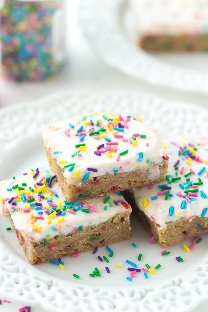 These Funfetti Frosted Blondies are dense, chewy and full of sprinkles! They're perfect for kids lunch boxes or a simple celebration!