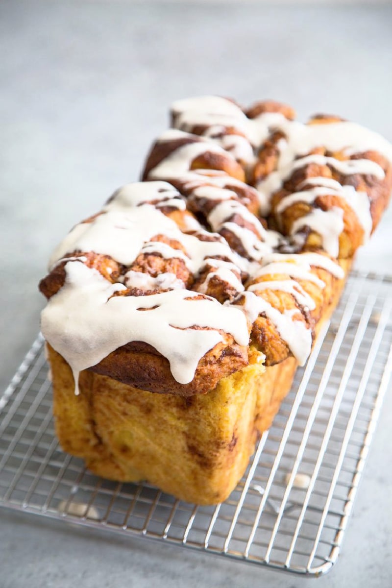 loaf of pumpkin pull apart bread on cooling rack