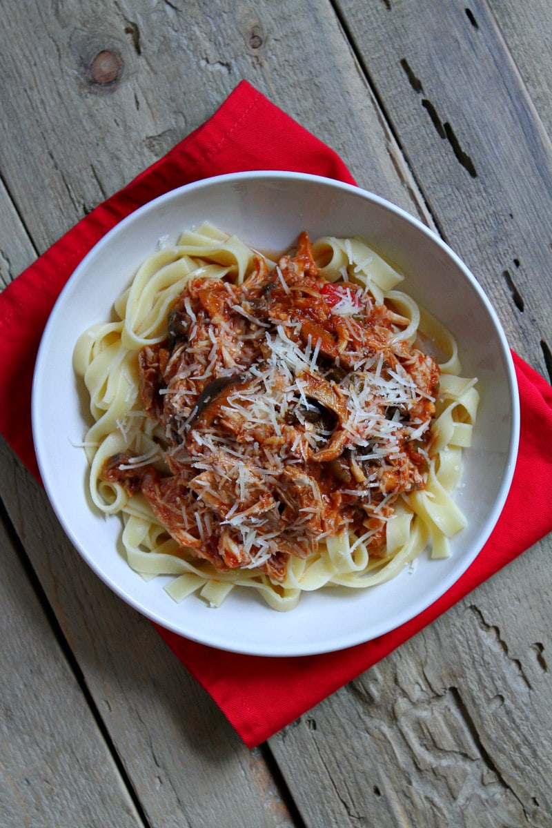 Slow Cooker Chicken Cacciatore served over noodles